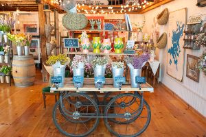 Barn INN Bloom gift & flower shop merchandise on a cart