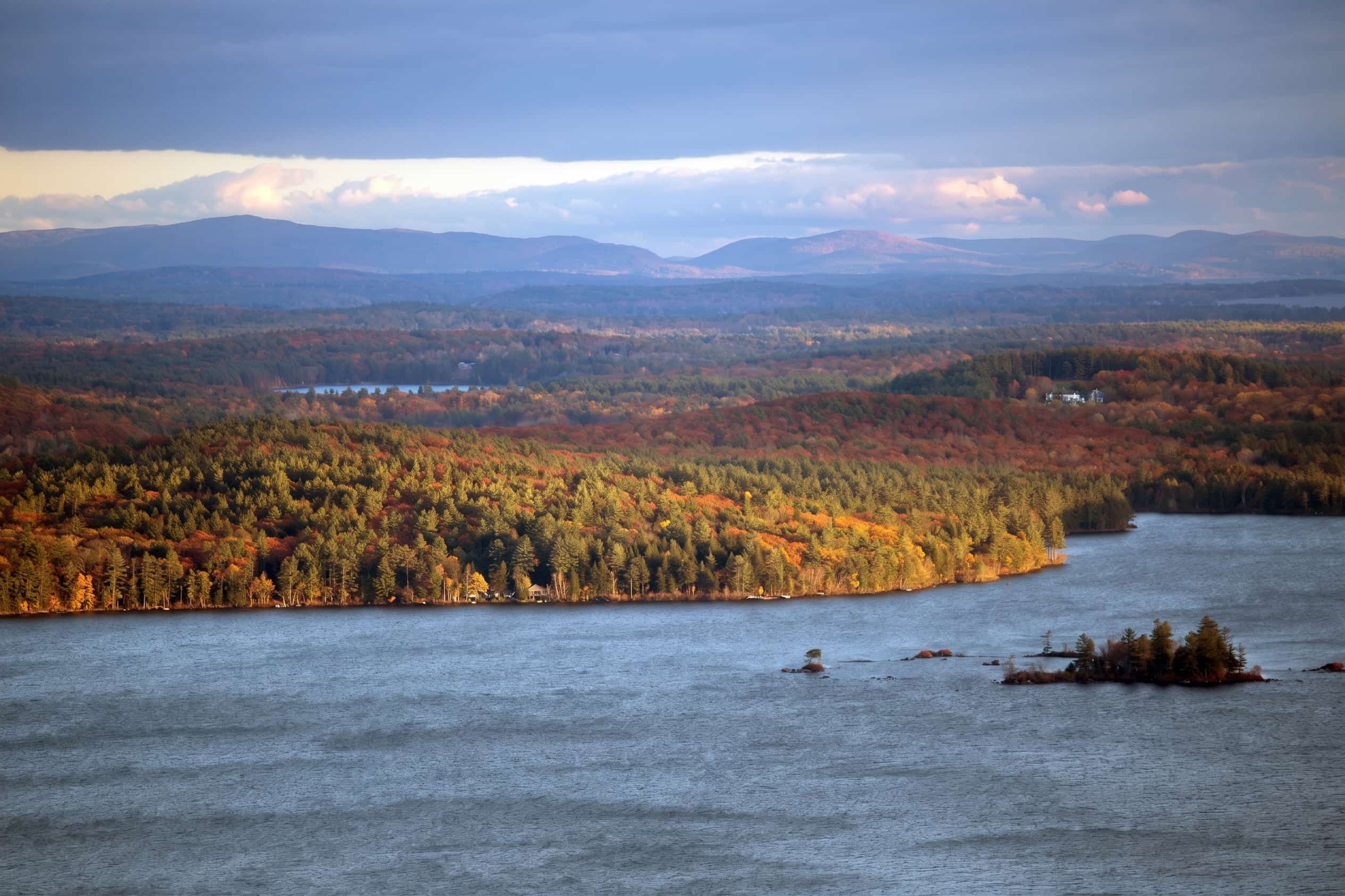 Squam Lake surrounded by fall foliage